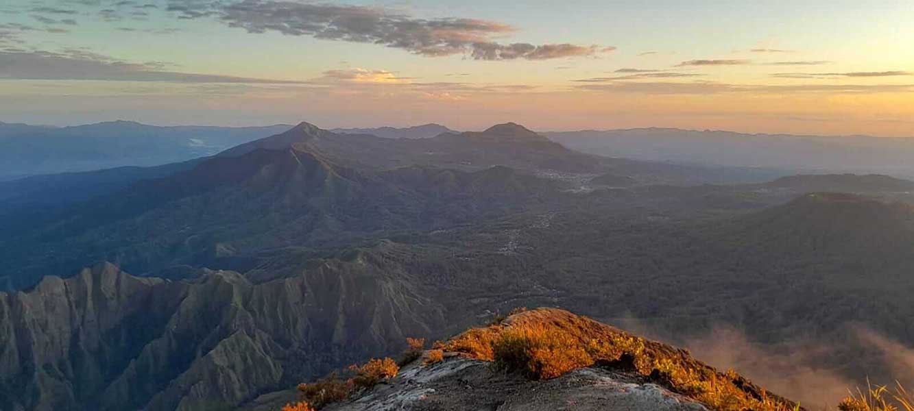 sunrise view from the summit of mount inerie on a private guided flores overland journey, ngada, bajawa